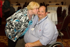 Mary Margaret Moore, Executive Director of Independent Living Center of the North Shore and Cape Ann Inc., and Joe Bellil of the Easter Seals, and the MWCIL Board of Directors.