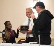 David Correia accepts NCIL Advocacy Award from Jennifer Lee and Steve Higgins