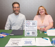 Matt and Brianna (DLC and REVUP) at DLC table