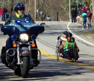 two men handcyclist racers and police motorcycle