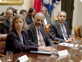 Liz Savage with Eric Holder and President Obama