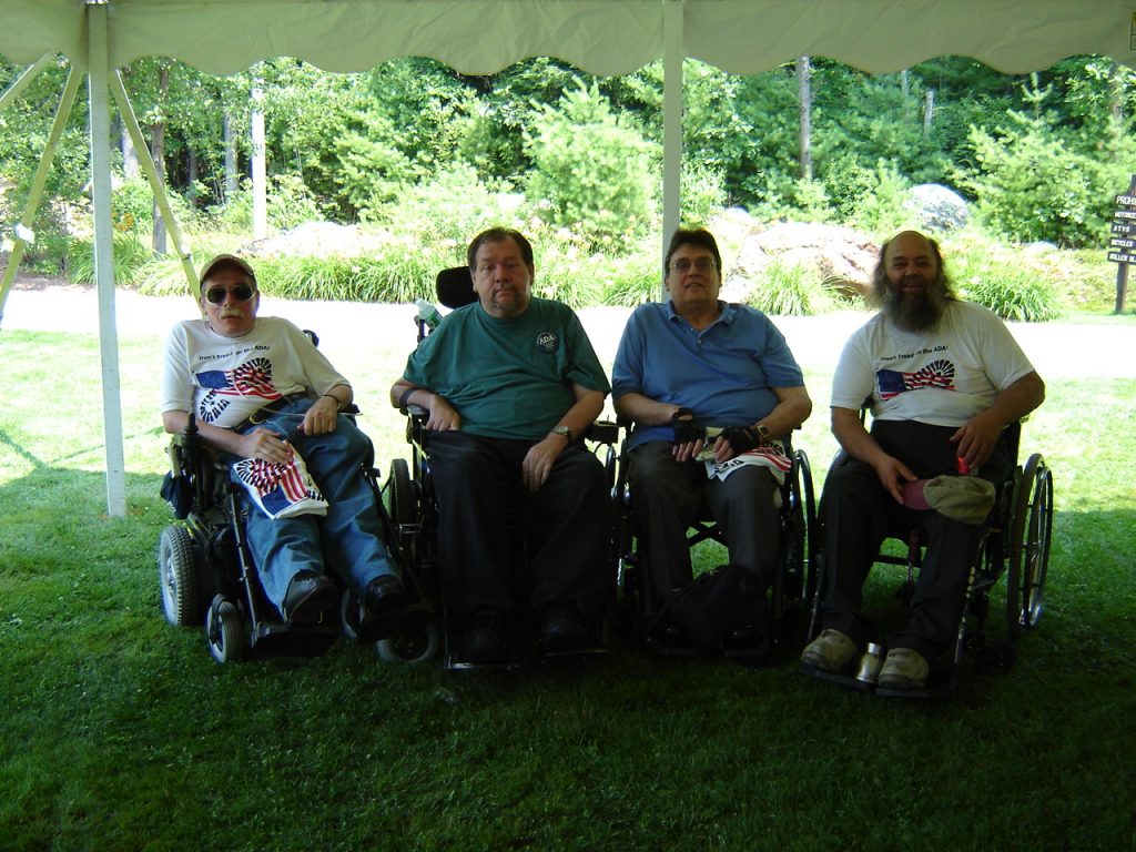 Paul with Charlie Carr and 2 other advocates of disability rights