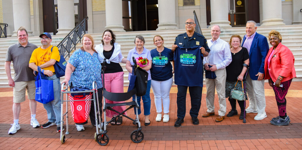 2024 Framingham ADA Day with MWCIL's Rose Quinn in the middle!